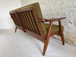 High quality 1960s teak sofa with new pirelli straps SOLD