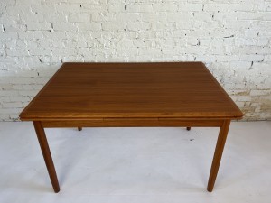 Classic Handsome Mid-century Modern draw-;leaf teak dining table - made in Denmark - newly refinished - expands to seat up to 8 - measures (SOLD)