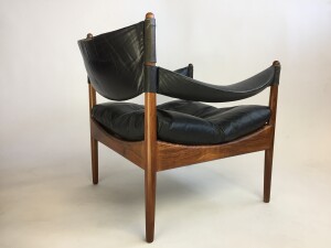 Gorgeous black leather and Rosewood armchair designed by Kristian Solmer Vedel, for Soren Willadsen - Made in Denmark circa 1963 - the leather is in very nice vintage condition and the rosewood frame has been newly refinished and looks incredible - a RARE find - check out our other postings of a matching chair and a matching side table (SOLD)