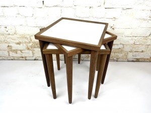 A set of 3 walnut midcentury stacking tables. measures 12.5 x 12.5 x 15 H (SOLD)