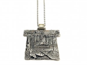 An unusual pewter articulating pendant with chain by Guy Vidal $200