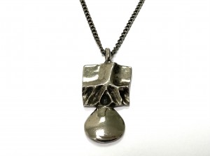 A 1970s pewter pendant by Robert Larin Montreal. Comes with a mile long chain. $150