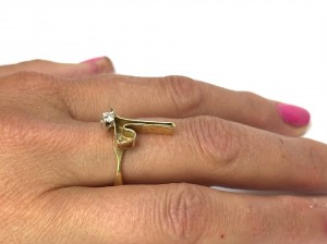 A unique 14k gold ring with a diamond Size 7.75 $450