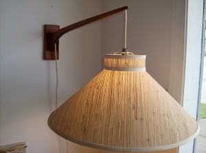 An incredible 1960's teak wall light - the arm moves with ease from side to side - these wall lights are perfect for any room in the house - over your favourite chair(for reading) -  bedside lights - on either side of your couch  - over your desk - many many uses - if you don't have alot of floor space they are a perfect solution - (SOLD)