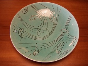 Stunning ceramic bowl made in California - black base and sides - with a beautiful bluey/green inside - (SOLD)